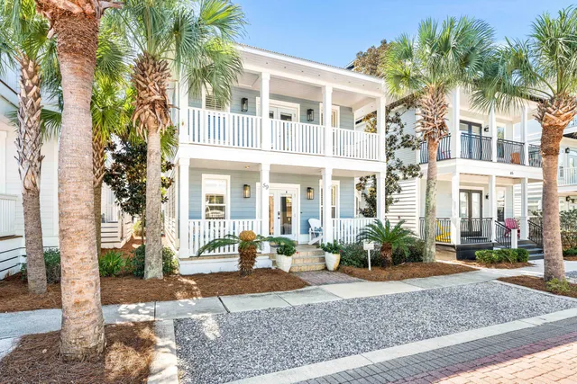 a front view of a building with garden