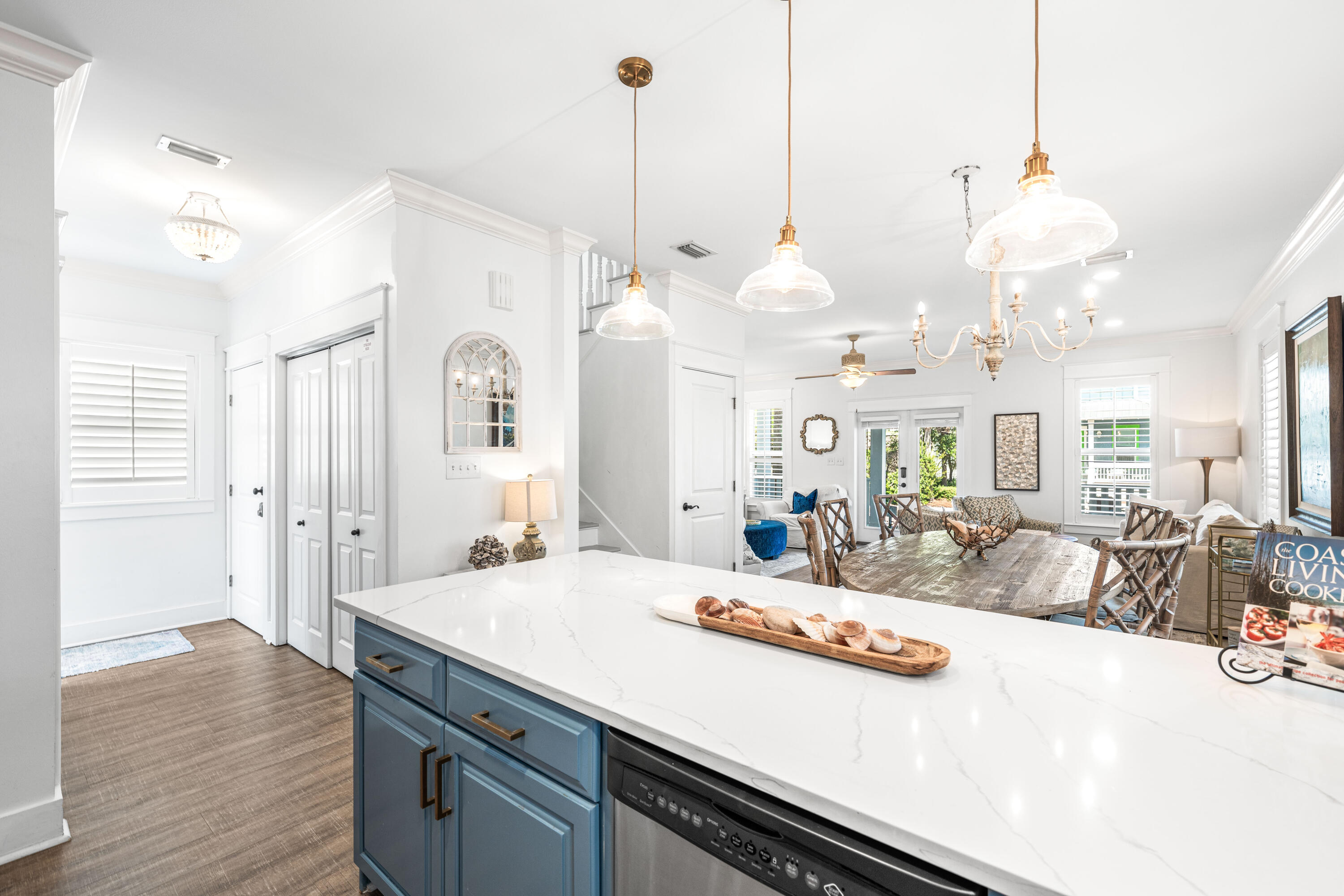 59 Endless Summer Way West Inlet Beach, FL 32461 - Photo 8 of 40 a large kitchen with kitchen island a stove a sink a center island and wooden floor