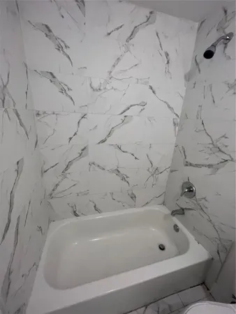 a bathroom with a bathtub