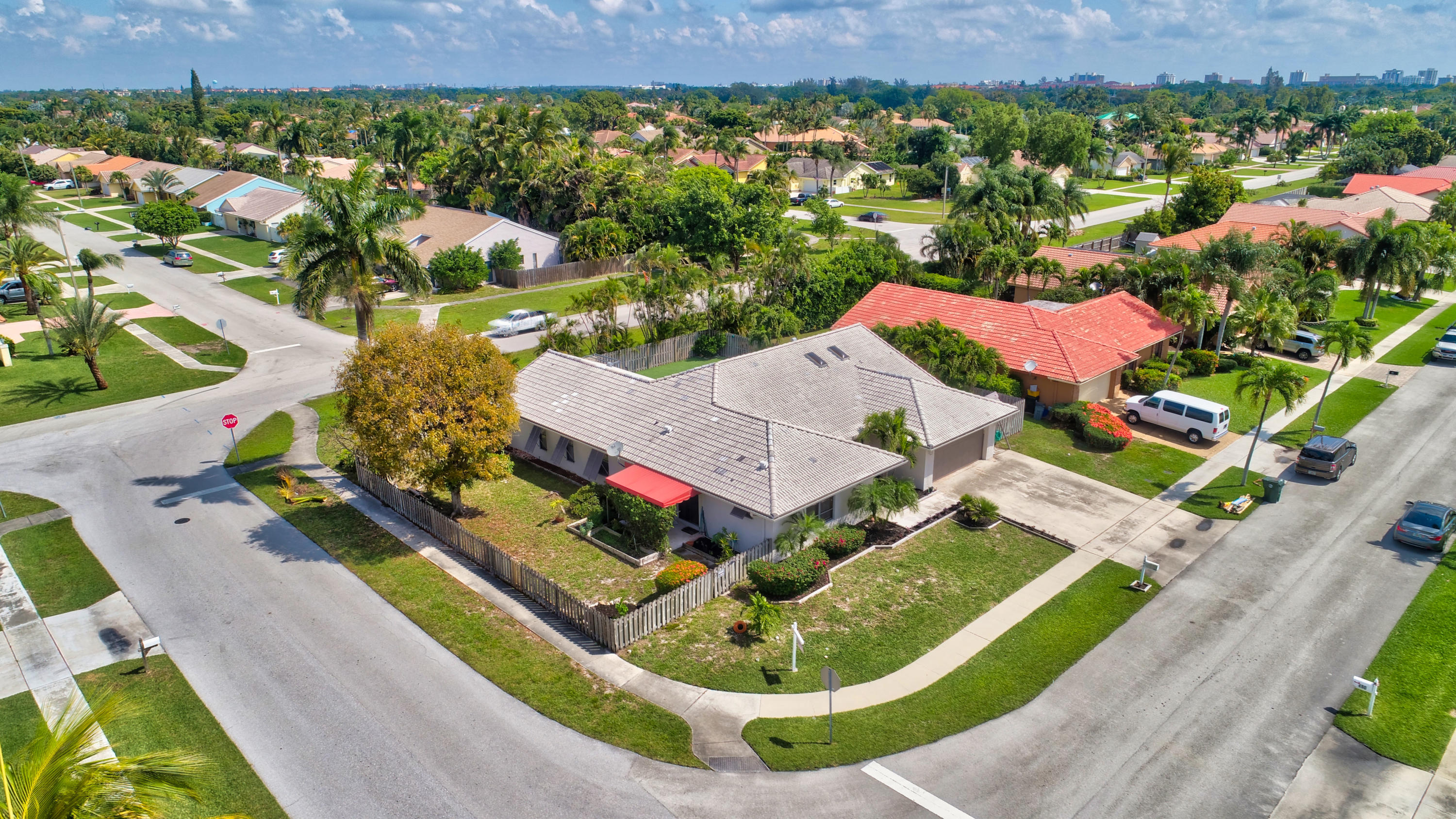 491 Northwest 72nd Street Boca Raton, FL 33487 - Photo 47 of 57 an aerial view of residential houses with outdoor space and swimming pool