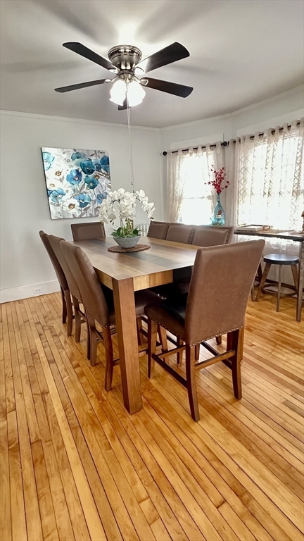 603 Temple Street Whitman, MA 02382 - Photo 12 of 40 a view of a dining room with furniture and wooden floor