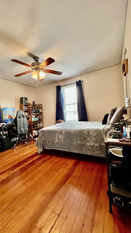 603 Temple Street Whitman, MA 02382 - Photo 18 of 40 a living room with furniture and a flat screen tv