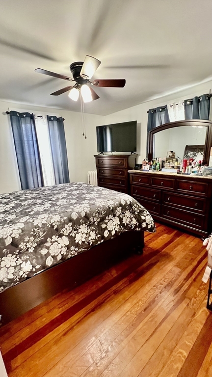 603 Temple Street Whitman, MA 02382 - Photo 19 of 40 a bed sitting in a bedroom and dressers next to a window