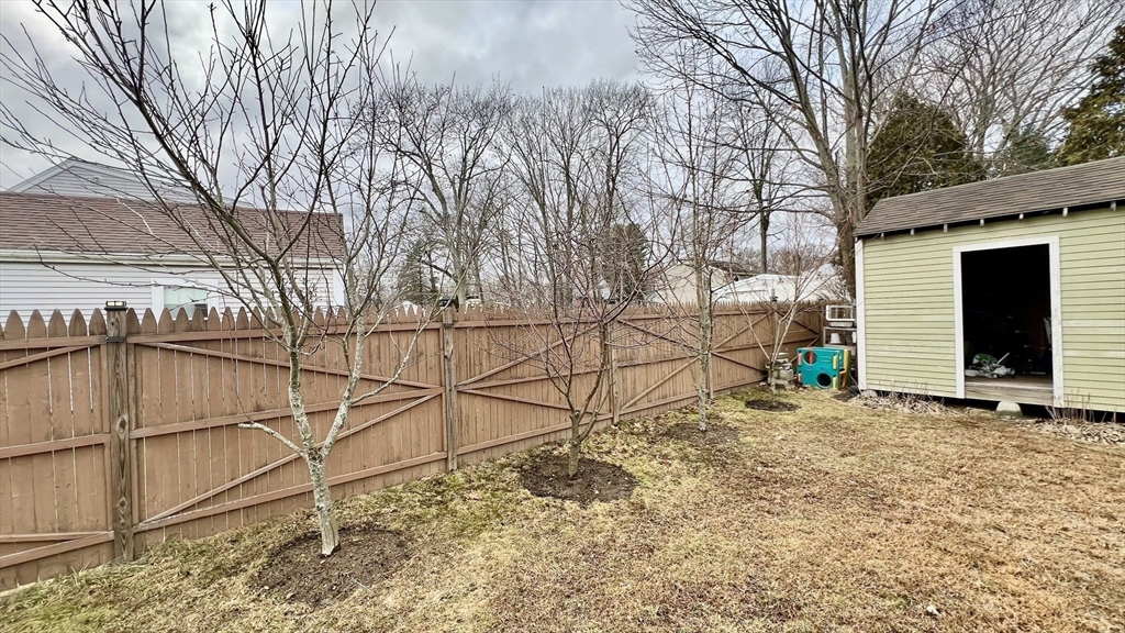 603 Temple Street Whitman, MA 02382 - Photo 28 of 40 a view of a backyard