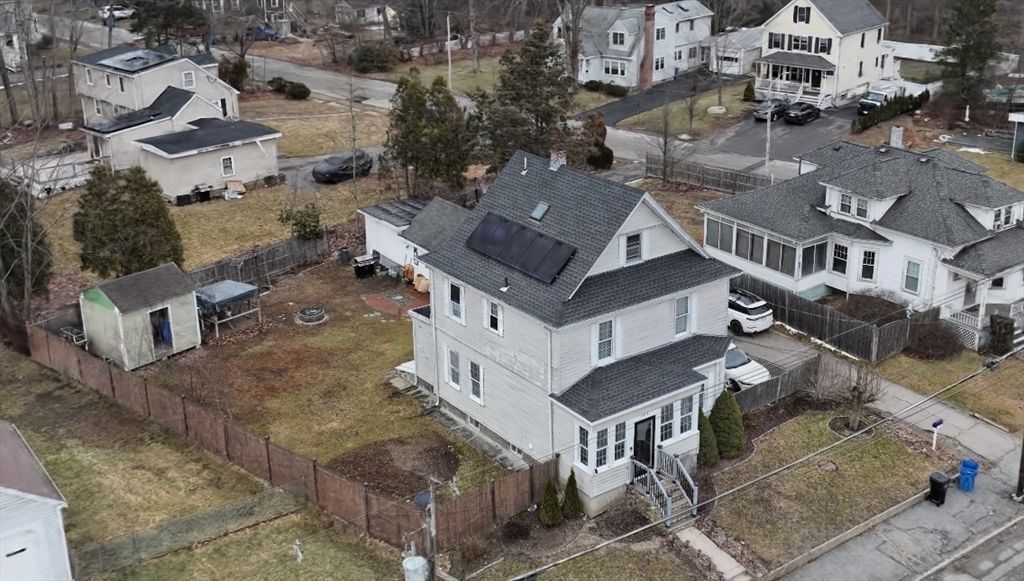 603 Temple Street Whitman, MA 02382 - Photo 3 of 40 an aerial view of residential houses with outdoor space