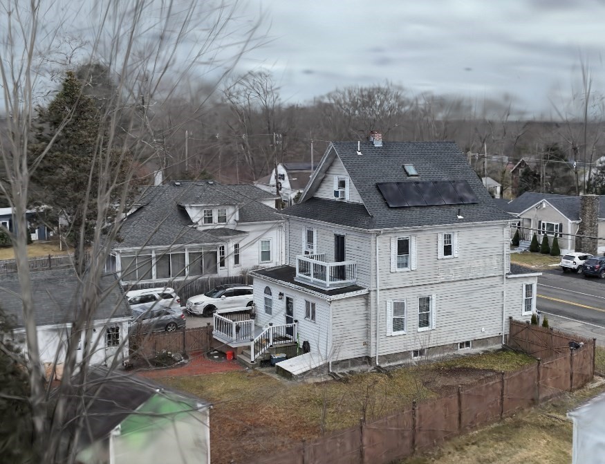603 Temple Street Whitman, MA 02382 - Photo 4 of 40 an aerial view of a house with roof deck