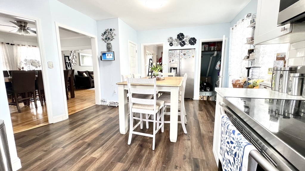 603 Temple Street Whitman, MA 02382 - Photo 7 of 40 a view of a dining room with furniture and wooden floor