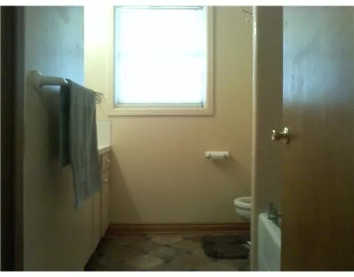 a bathroom with a window