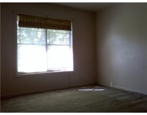 112 Rice Drive Portland, TX 78374 - Photo 6 of 10 a view of an empty room and window