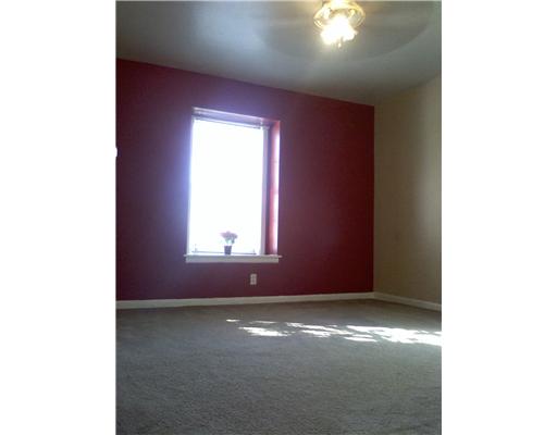 112 Rice Drive Portland, TX 78374 - Photo 8 of 10 a view of empty room with window