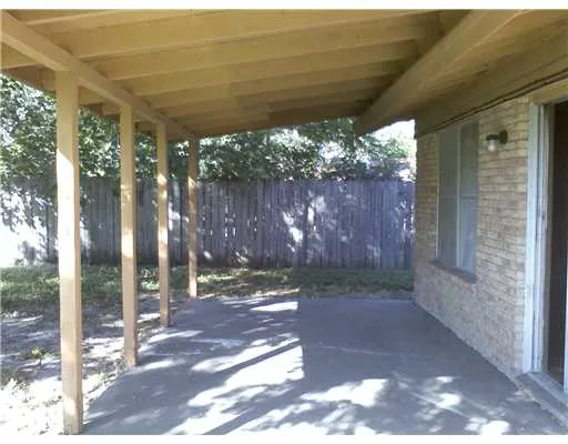 a view of a room with a backyard