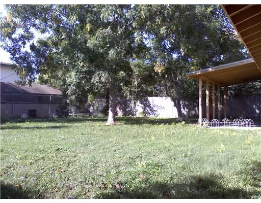 112 Rice Drive Portland, TX 78374 - Photo 10 of 10 a backyard of a house with lots of green space