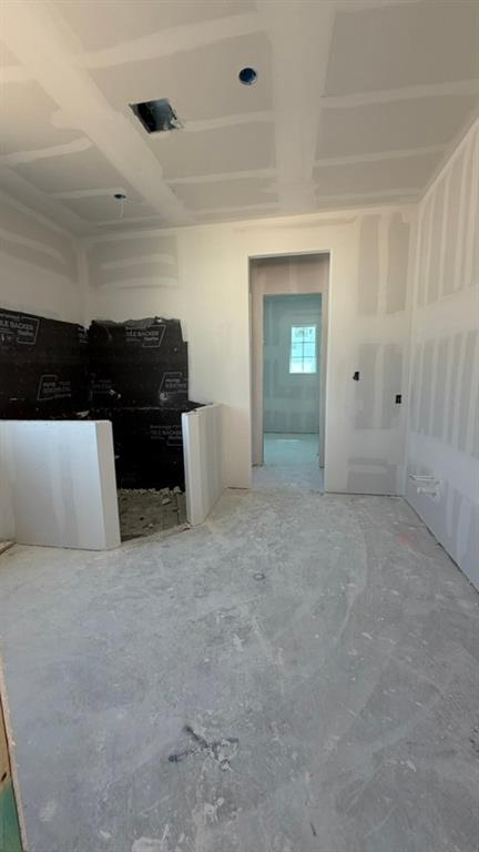 1002 Perrin Lane Van Alstyne, TX 75495 - Photo 8 of 9 a view of an empty room with cabinet and cabinet