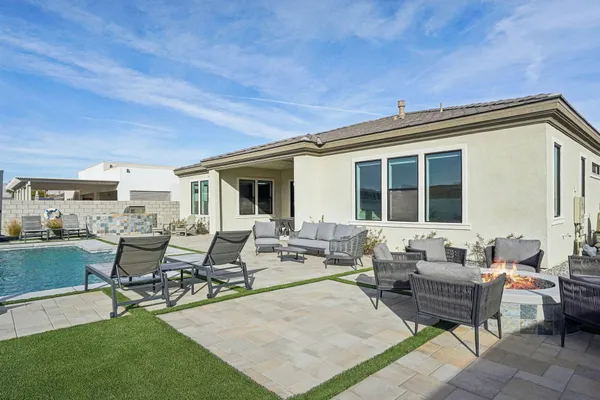 a view of a living room and kitchen