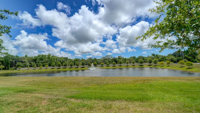 a view of a house with backyard
