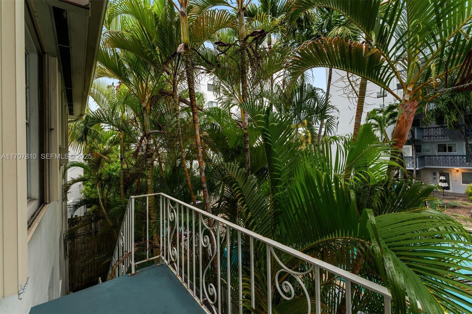 1622 Bay Road Miami Beach, FL 33139 - Photo 21 of 24 a view of balcony and yard