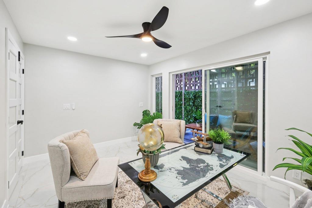 2600 Torrey Pines Road, Unit A13 La Jolla, CA 92037 - Photo 18 of 65 a living room with furniture and window