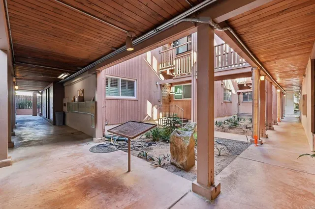 a view of kitchen with sink and natural light