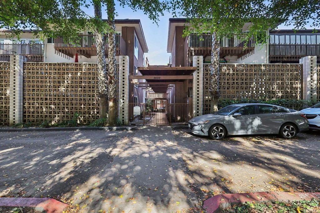 2600 Torrey Pines Road, Unit A13 La Jolla, CA 92037 - Photo 29 of 65 a view of a car parked in front of a building