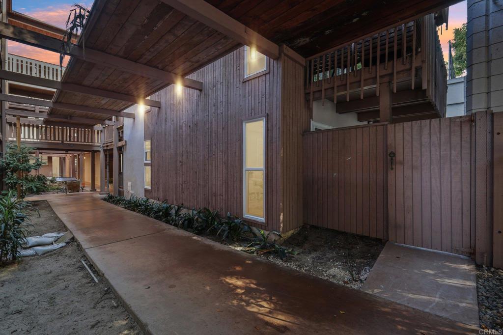 2600 Torrey Pines Road, Unit A13 La Jolla, CA 92037 - Photo 55 of 65 a view of a house with a backyard