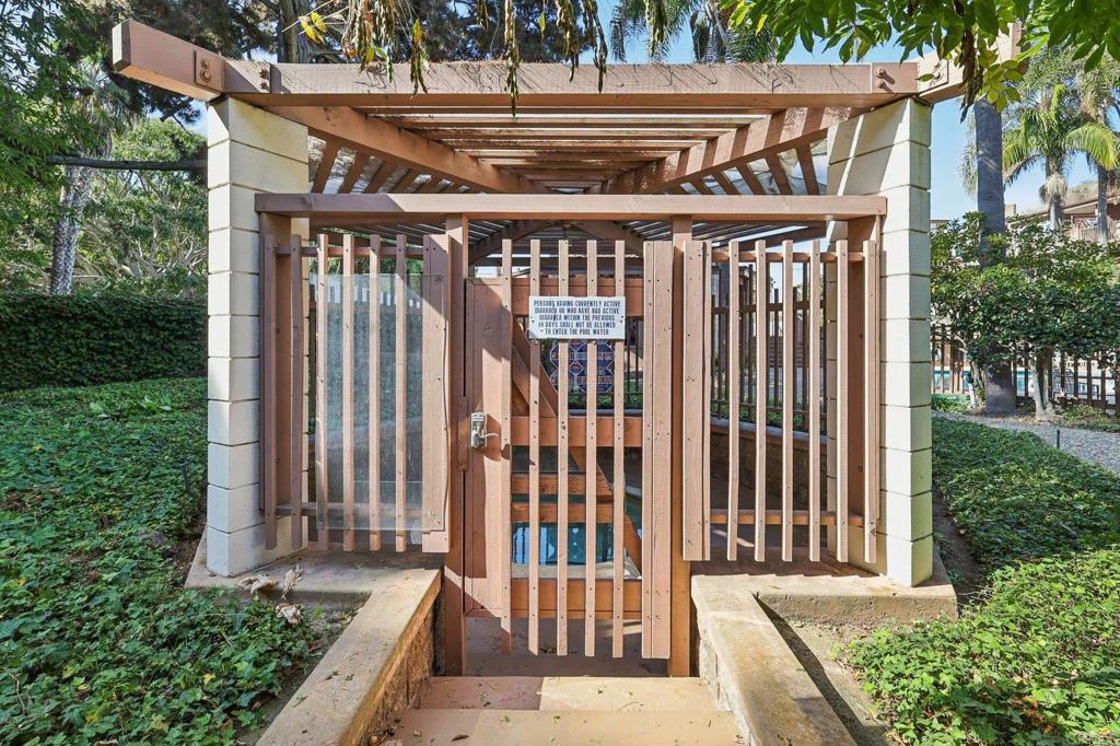 2600 Torrey Pines Road, Unit A13 La Jolla, CA 92037 - Photo 63 of 65 a view of a wooden door with a house
