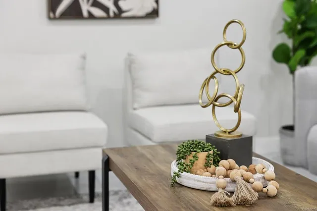 a bathroom with a sink mirror and a bathtub