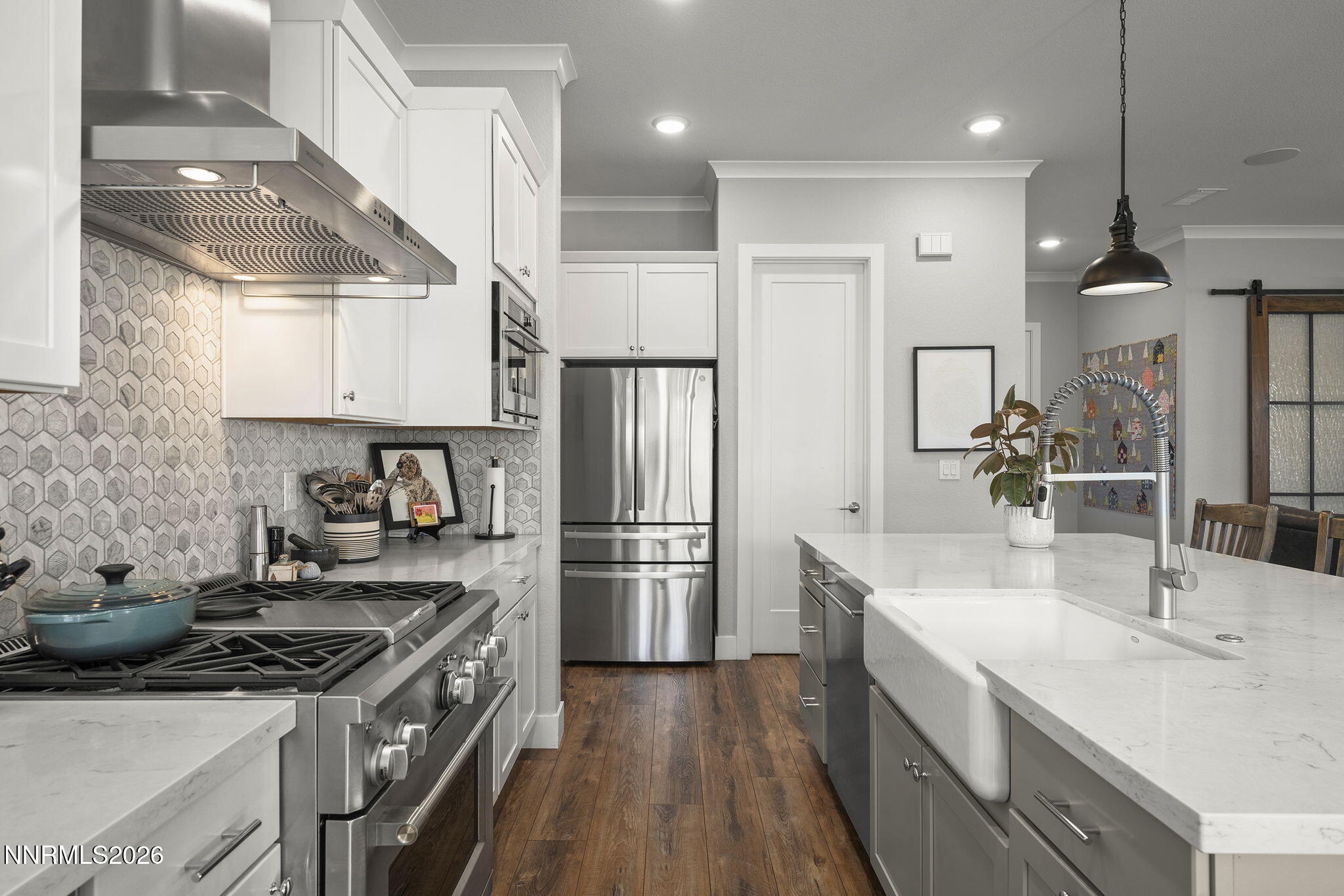 8726 Larkhaven Court Reno, NV 89523 - Photo 11 of 41 a kitchen with a sink stainless steel appliances and cabinets