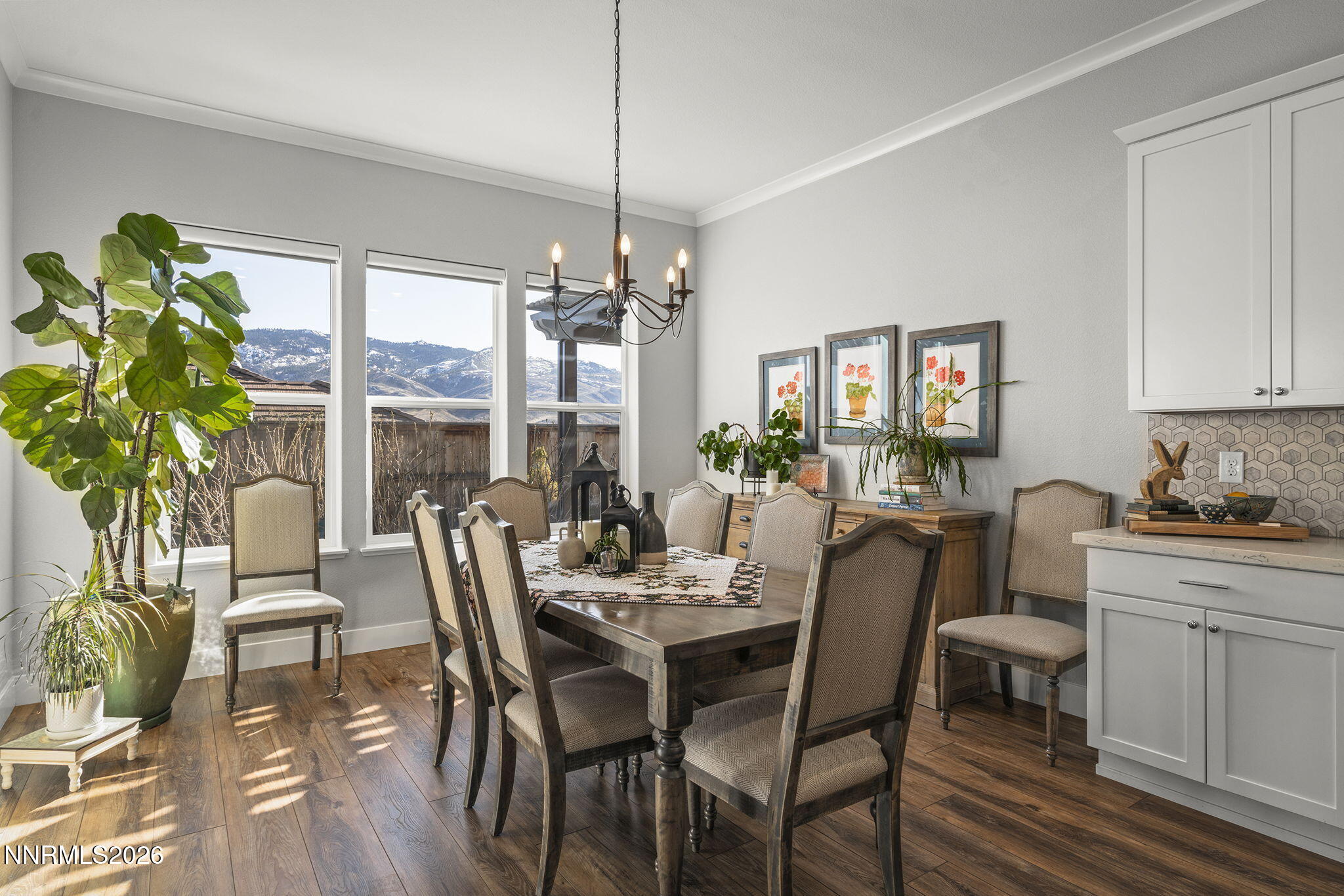 8726 Larkhaven Court Reno, NV 89523 - Photo 14 of 41 a dining room with furniture a livingroom and chandelier