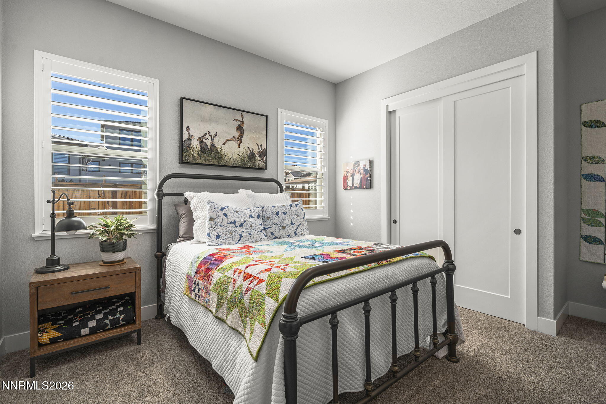 8726 Larkhaven Court Reno, NV 89523 - Photo 21 of 41 a bedroom with a bed and a window