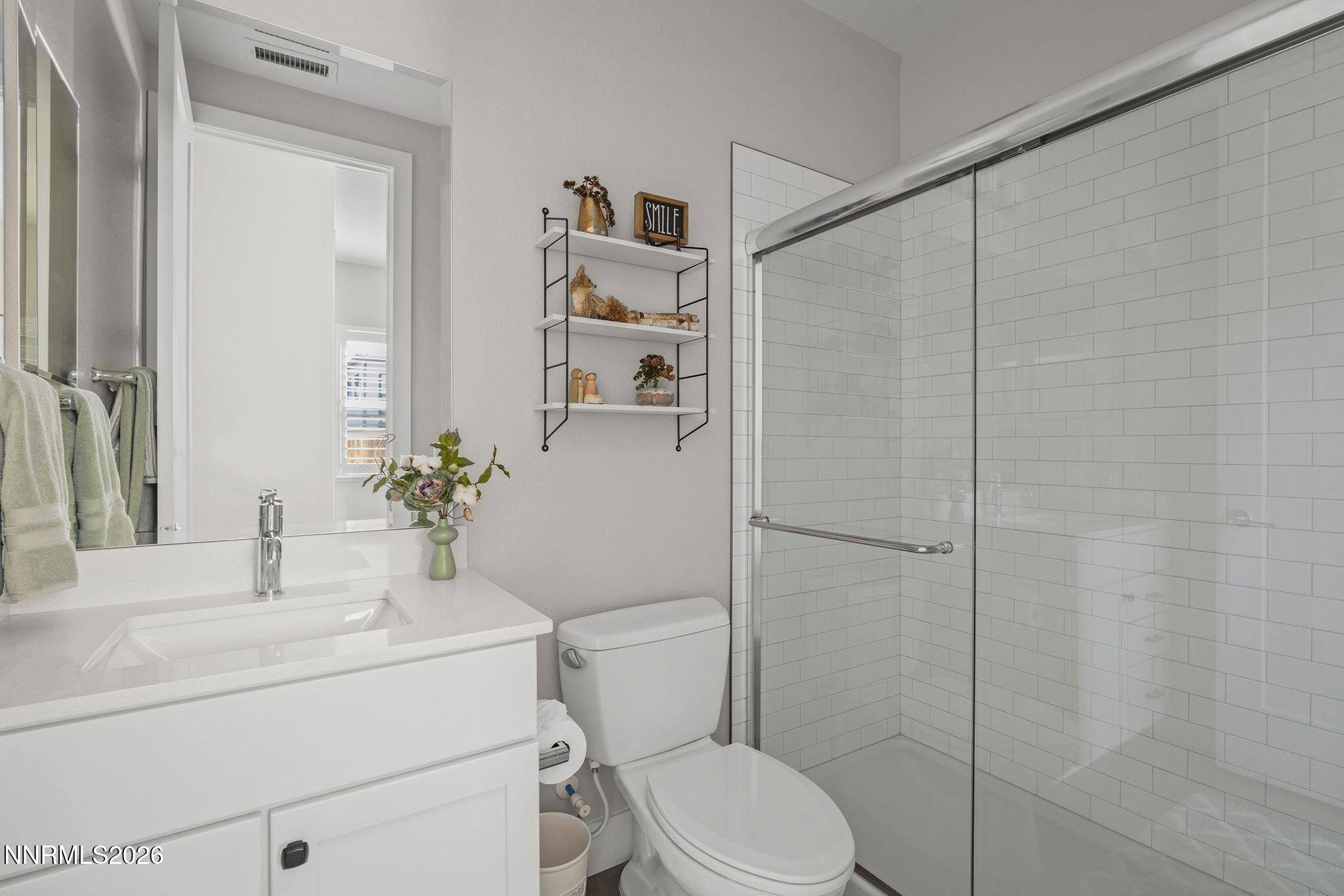 8726 Larkhaven Court Reno, NV 89523 - Photo 22 of 41 a bathroom with a sink toilet and shower
