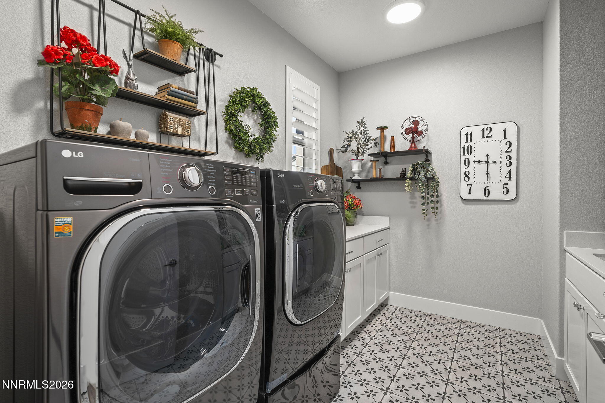 8726 Larkhaven Court Reno, NV 89523 - Photo 24 of 41 a utility room with dryer and washer