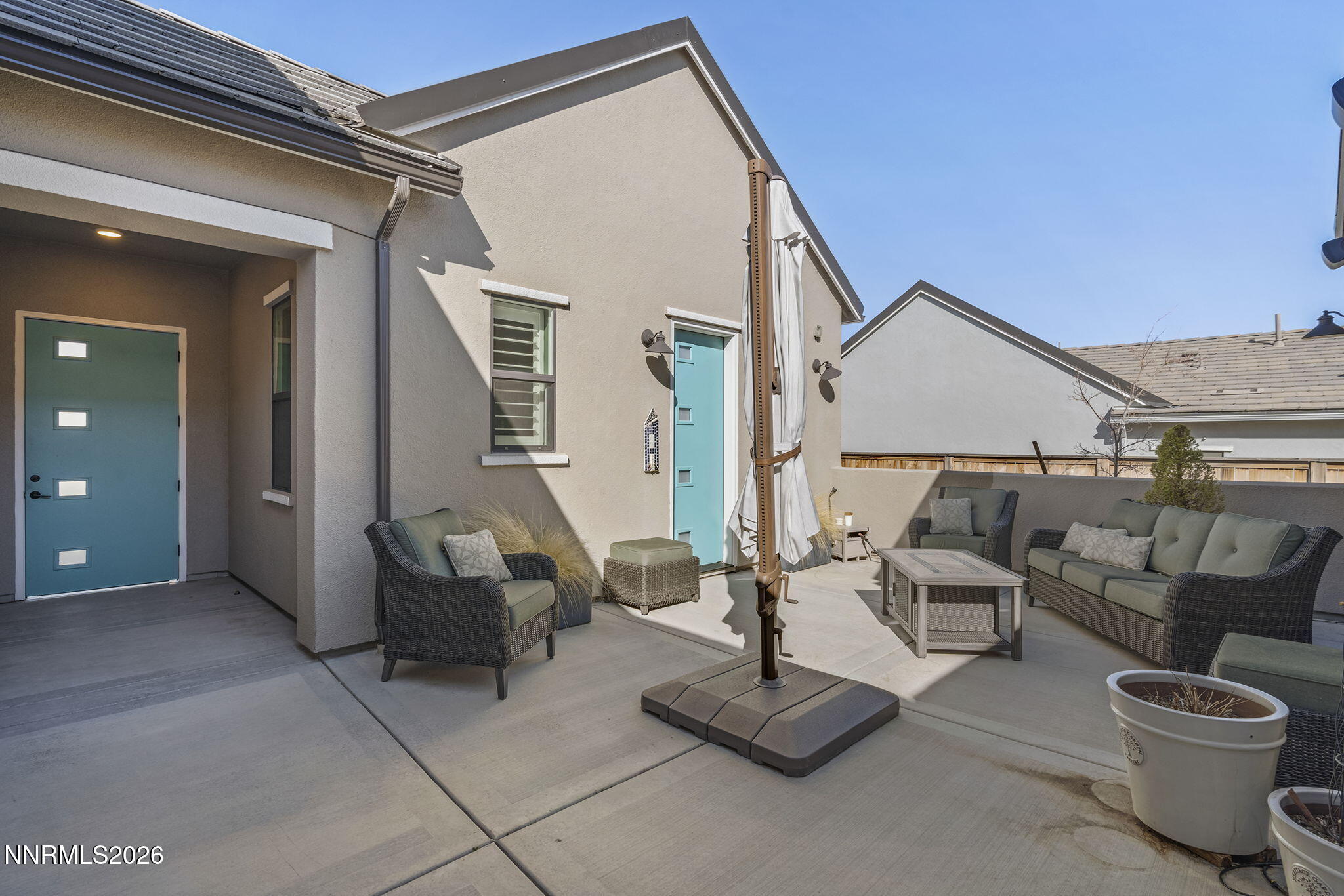 8726 Larkhaven Court Reno, NV 89523 - Photo 27 of 41 a view of a patio with table and chairs