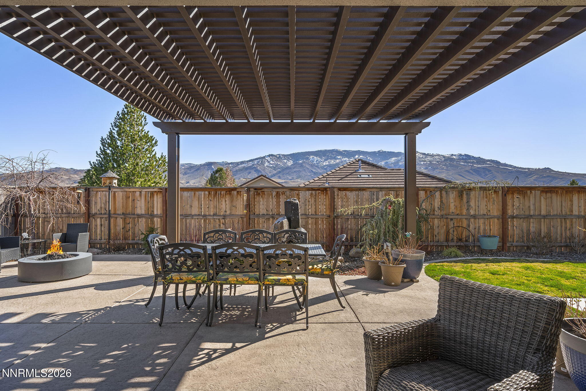 8726 Larkhaven Court Reno, NV 89523 - Photo 32 of 41 a view of a patio with swimming pool and sitting area