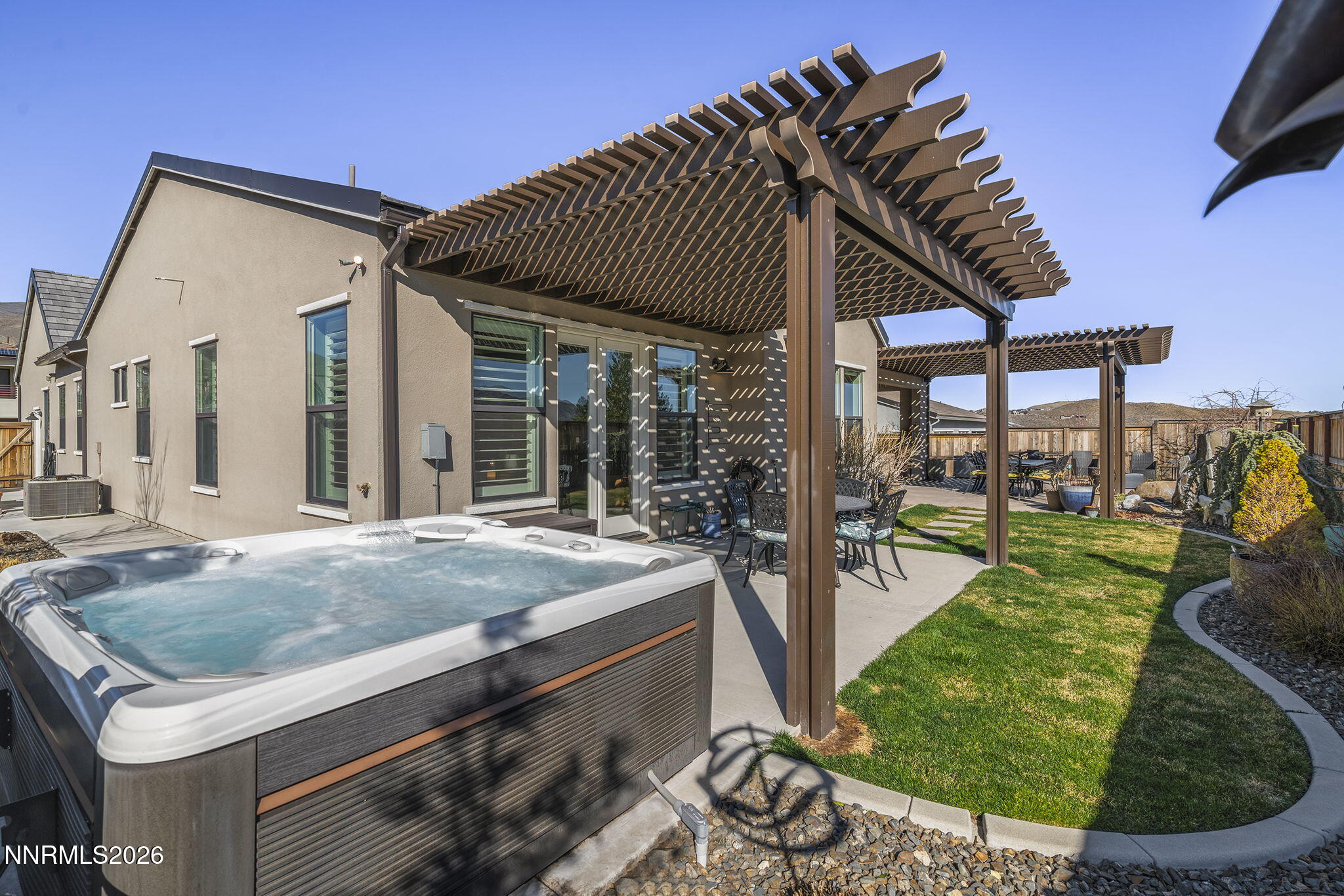 8726 Larkhaven Court Reno, NV 89523 - Photo 40 of 41 a view of a house with backyard porch and sitting area