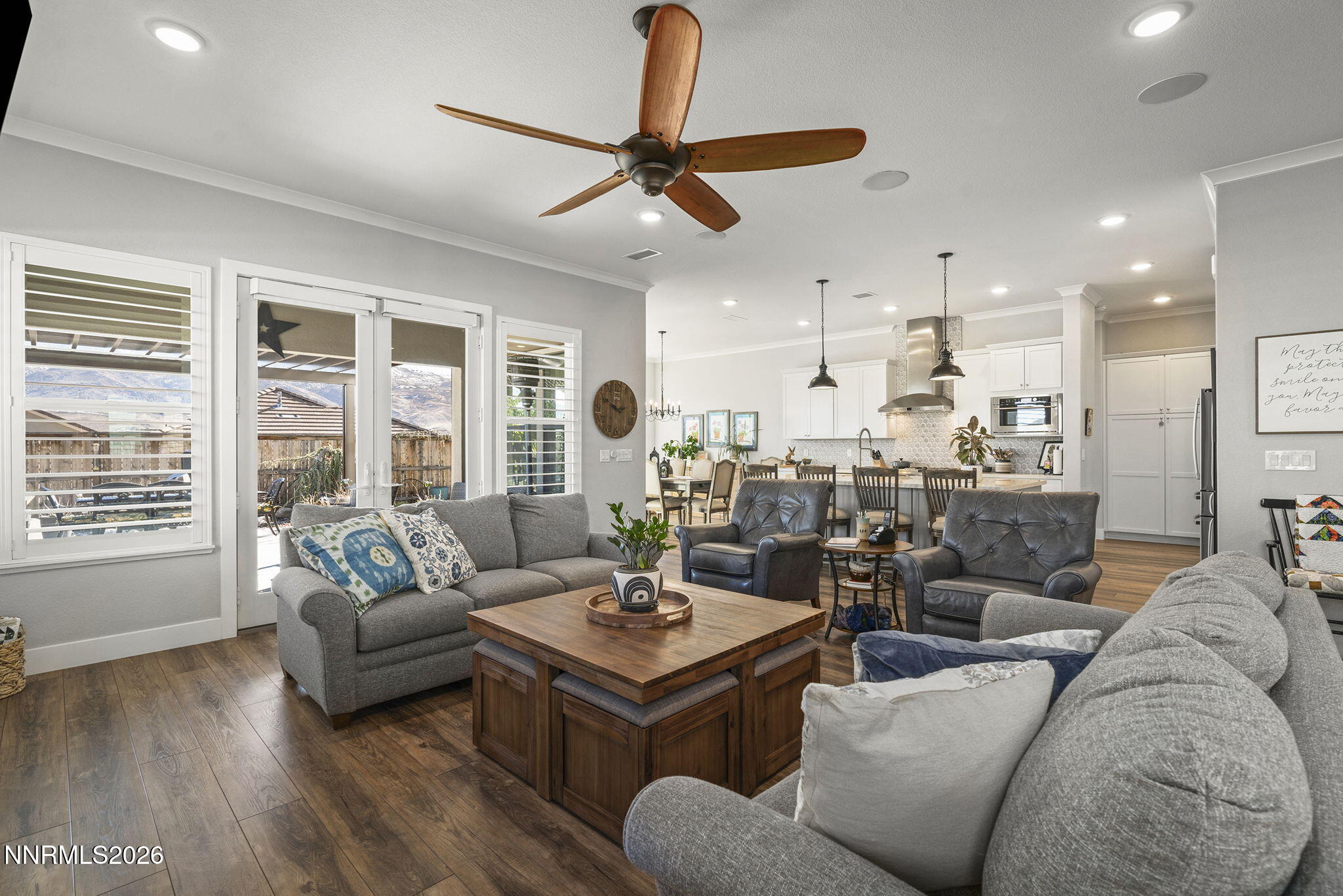 8726 Larkhaven Court Reno, NV 89523 - Photo 8 of 41 a living room with furniture kitchen view and a large window