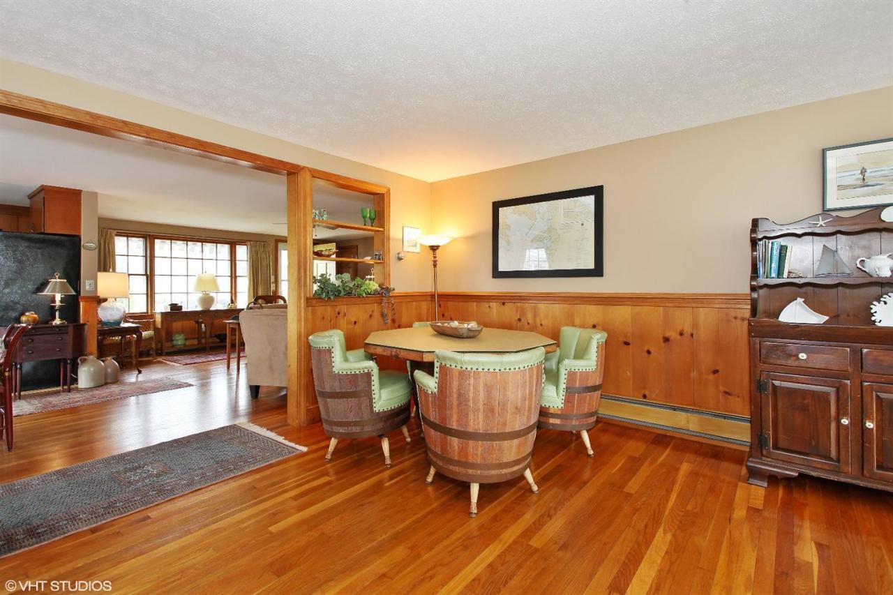 58 Rope Walk Road Bourne, MA 02532 - Photo 8 of 20 a view of a dining room with furniture and wooden floor