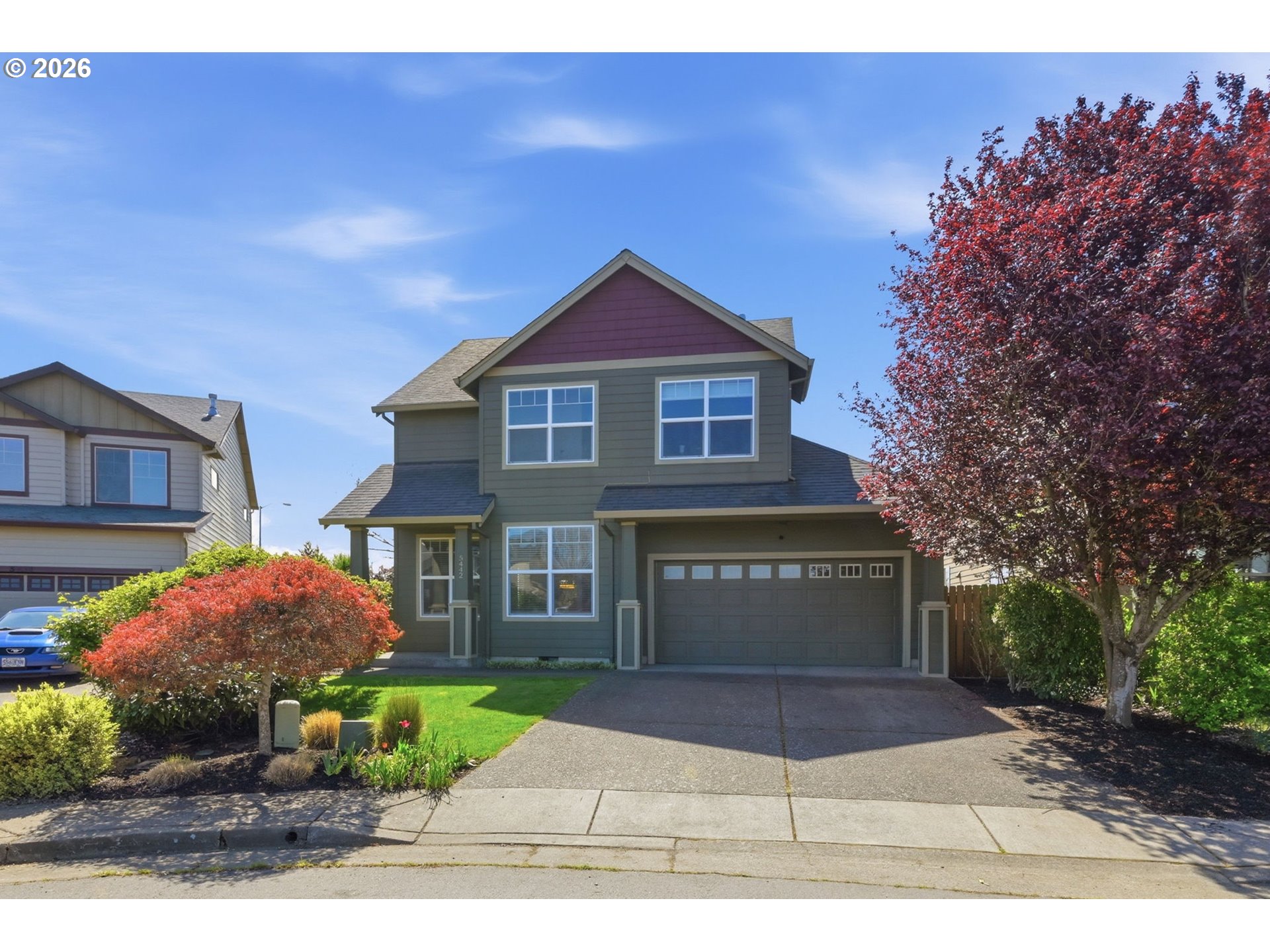 5442 Pranz Place Eugene, OR 97402 - Photo 1 of 34 a view of a house with a yard and potted plants