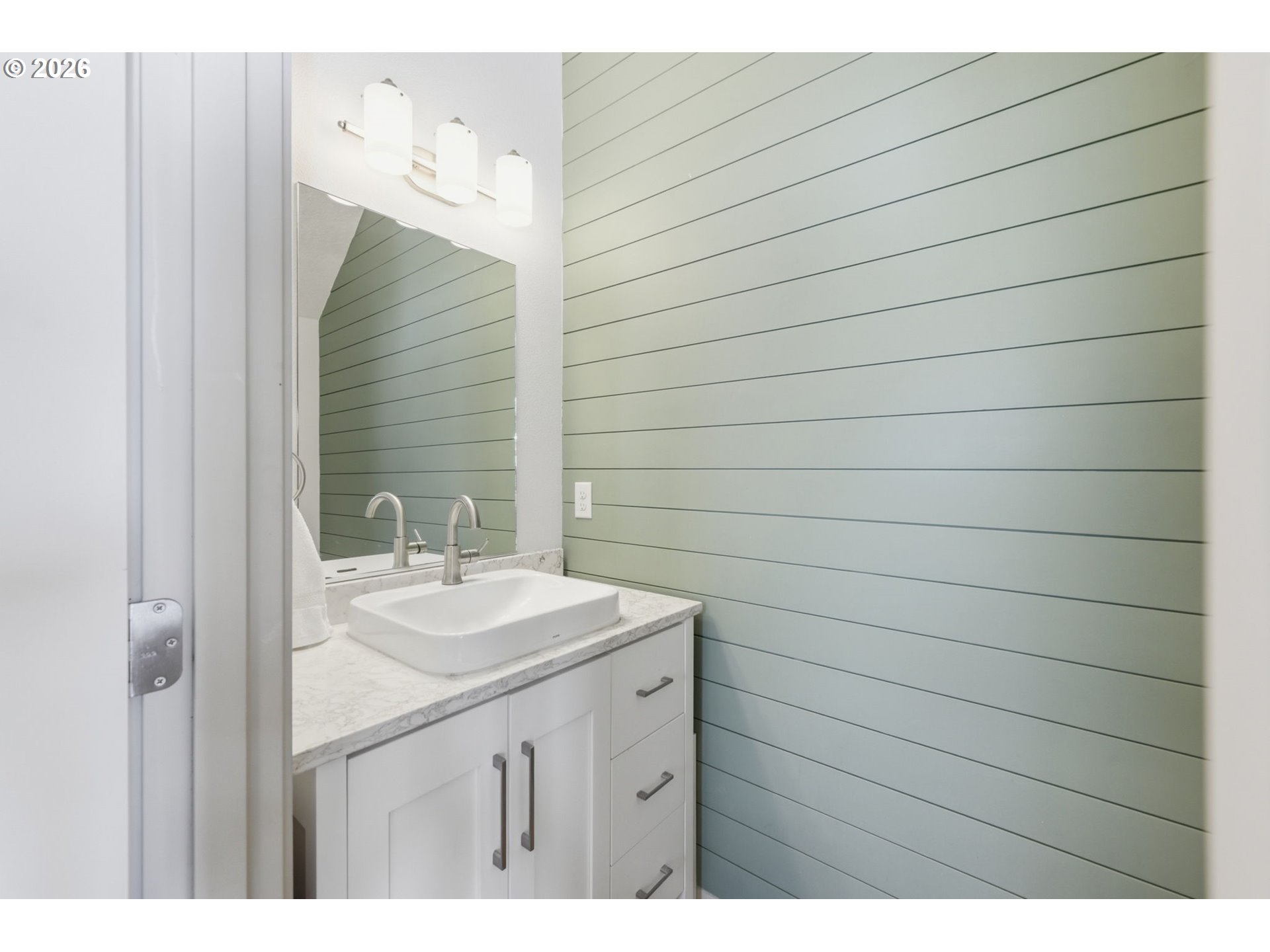 5442 Pranz Place Eugene, OR 97402 - Photo 11 of 34 a bathroom with a sink and a mirror