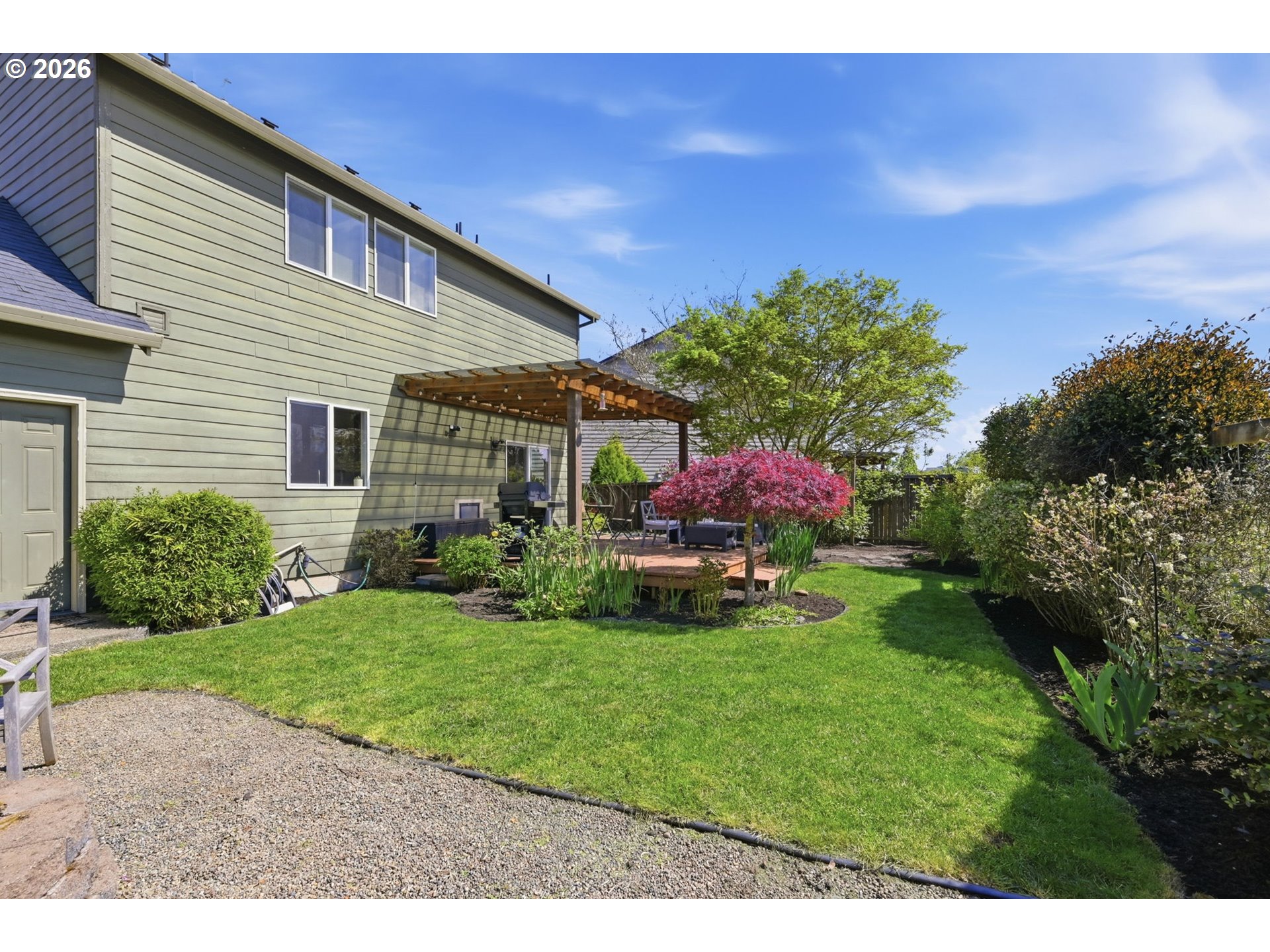 5442 Pranz Place Eugene, OR 97402 - Photo 23 of 34 a front view of a house with garden