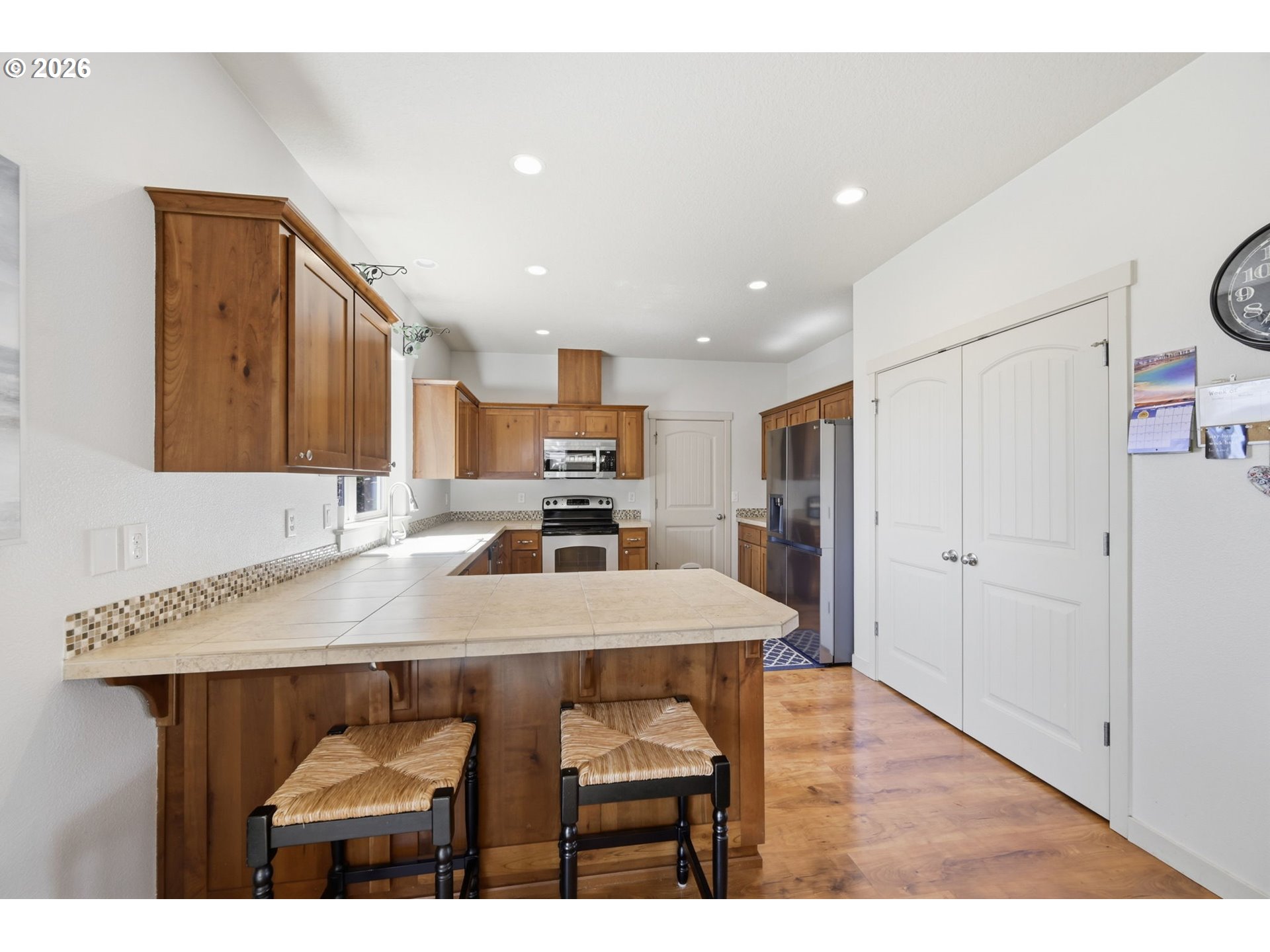 5442 Pranz Place Eugene, OR 97402 - Photo 6 of 34 a kitchen with a table and chairs