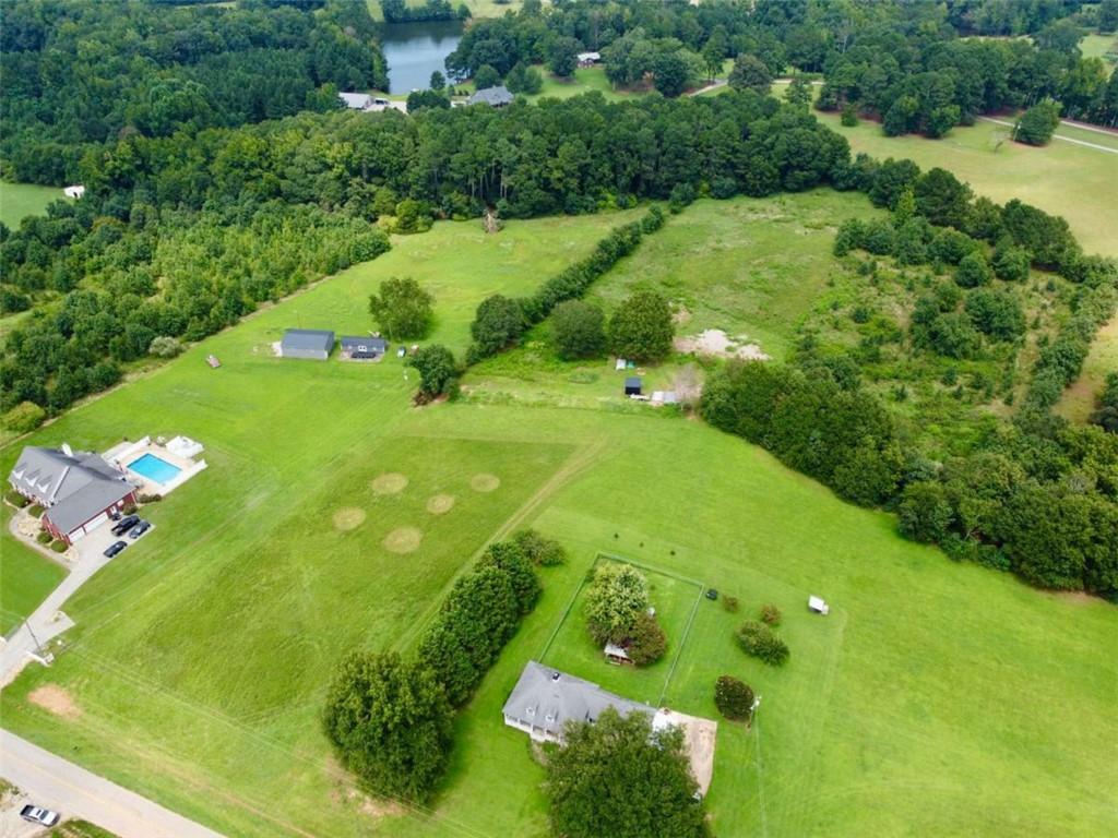 2536 Brindle Farmer Road Good Hope, GA 30641 - Photo 16 of 17 a lush green field with lots of green space