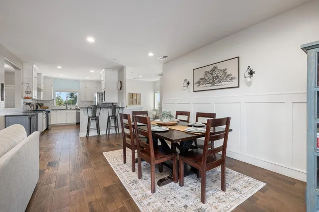 a kitchen with a sink stove and refrigerator