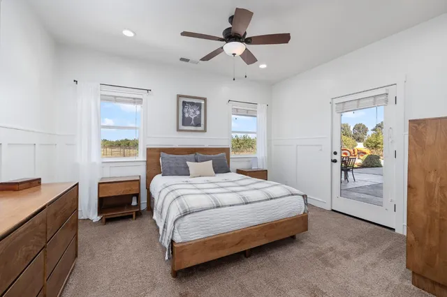 a bathroom with a tub and shower
