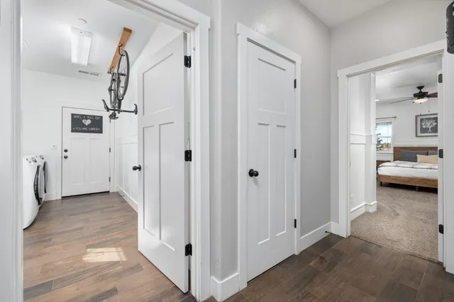 a bed room with a bed and a window