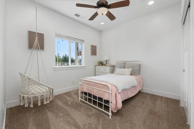 a view of a porch with chairs and backyard