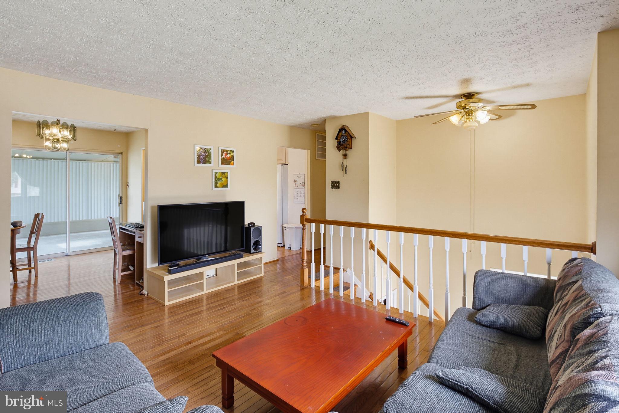 7802 Bastille Road Severn, MD 21144 - Photo 3 of 34 Spacious living area with natural light.