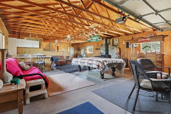 a view of a couch and chairs in the patio