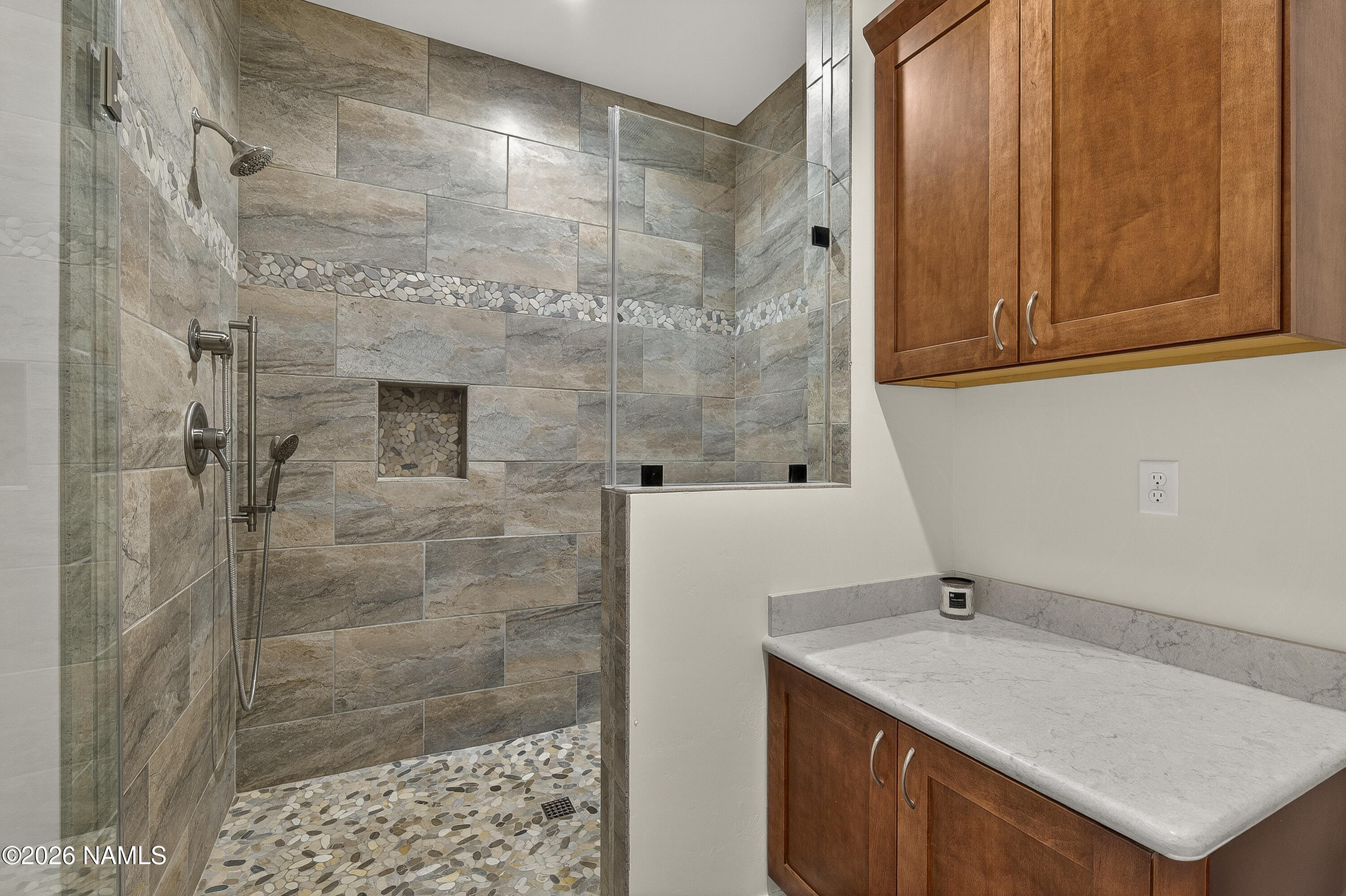 6560 Johnson Ranch Road Flagstaff, AZ 86004 - Photo 23 of 57 a bathroom with a shower and a sink
