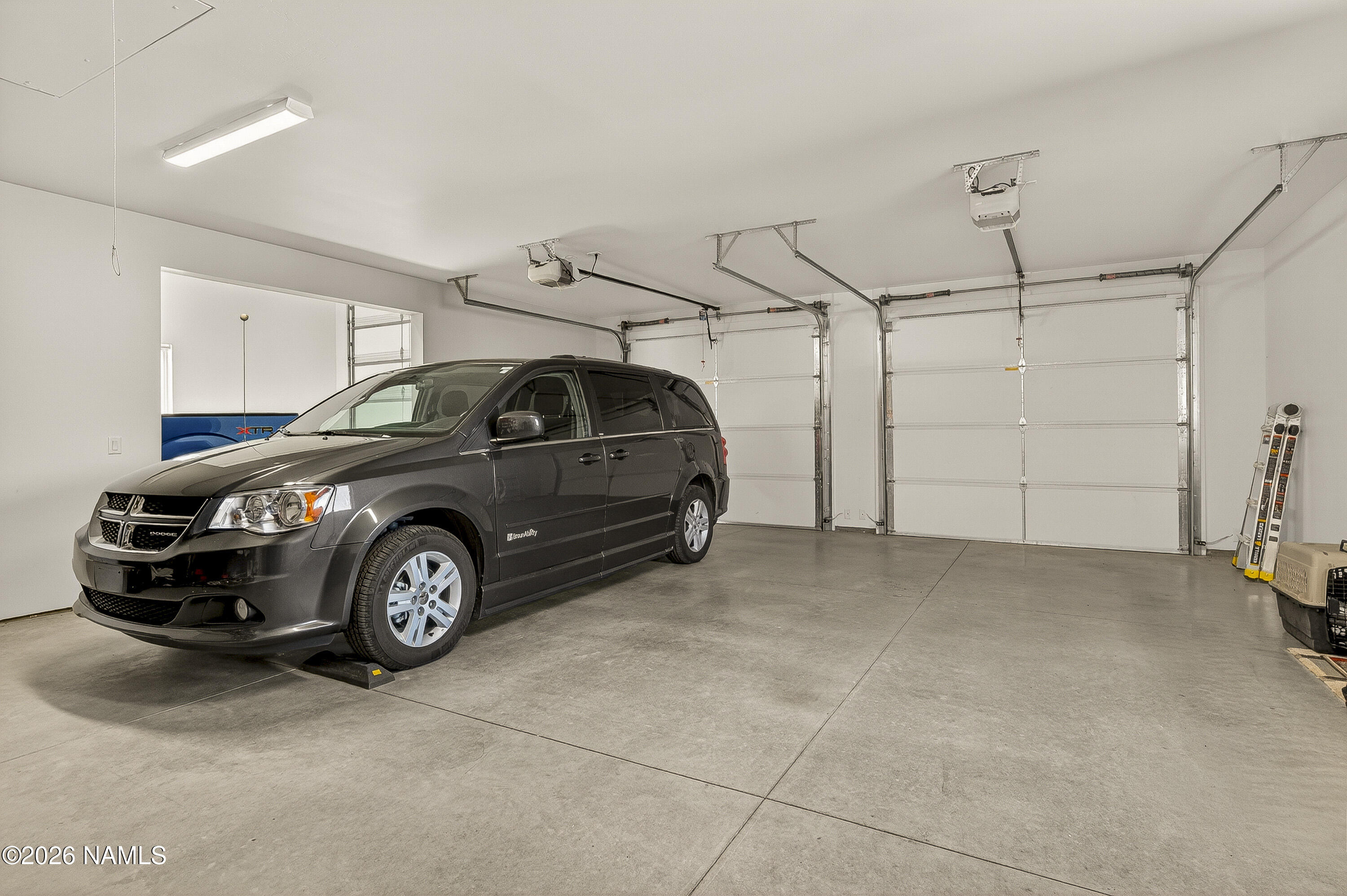 6560 Johnson Ranch Road Flagstaff, AZ 86004 - Photo 35 of 57 a view of a garage and car parked