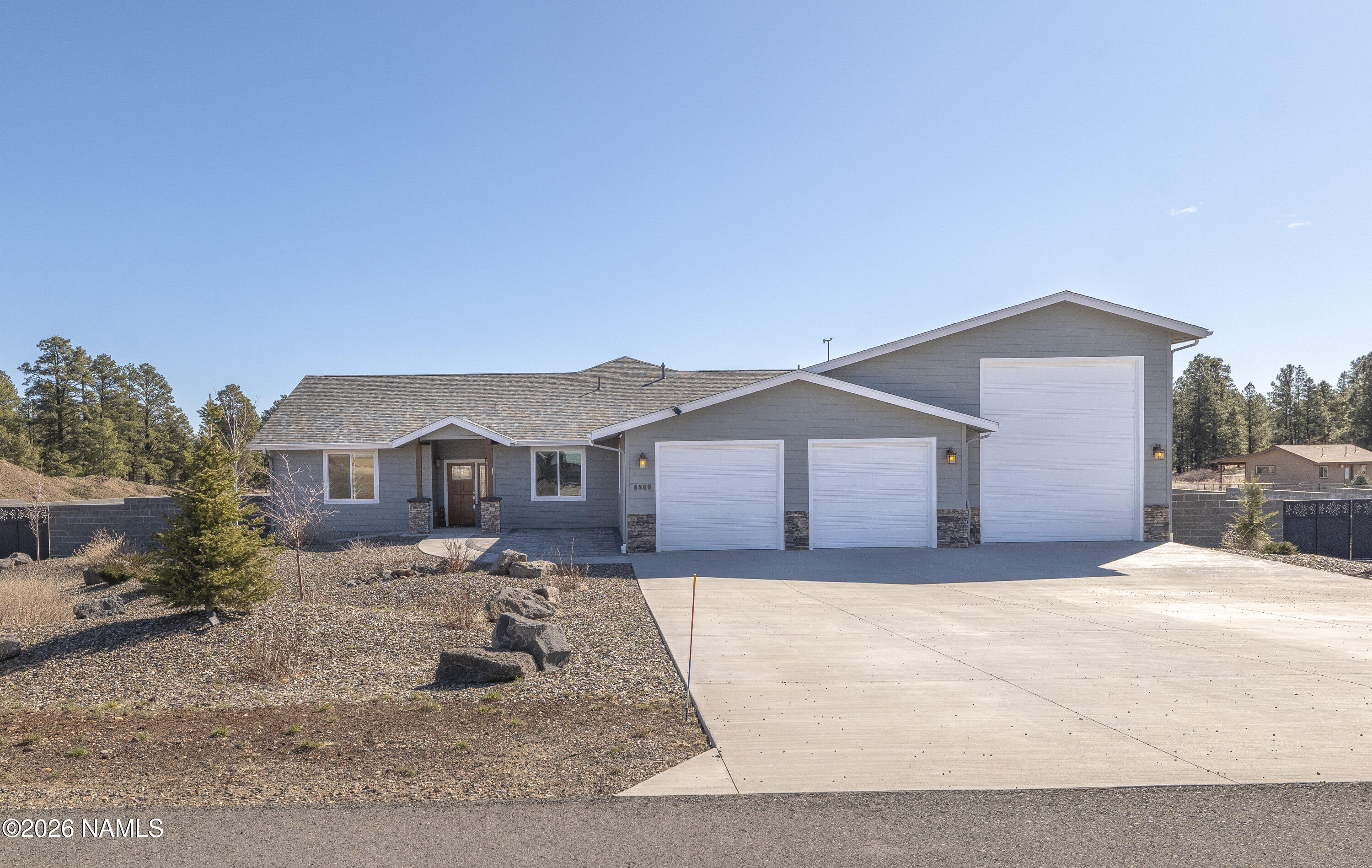 6560 Johnson Ranch Road Flagstaff, AZ 86004 - Photo 43 of 57 a house view with a outdoor space